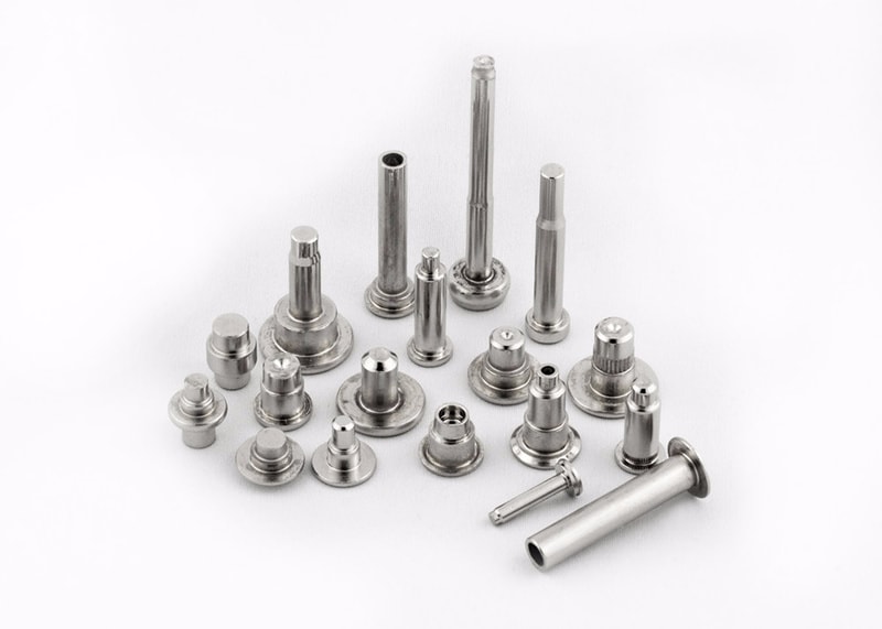 Precision shoulder rivets manufactured with advanced multi-blow technology